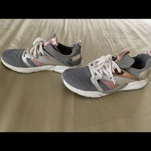 Women Skechers.  Color Gray/Silver/Mauve. Slightly Worn.  Size 6.